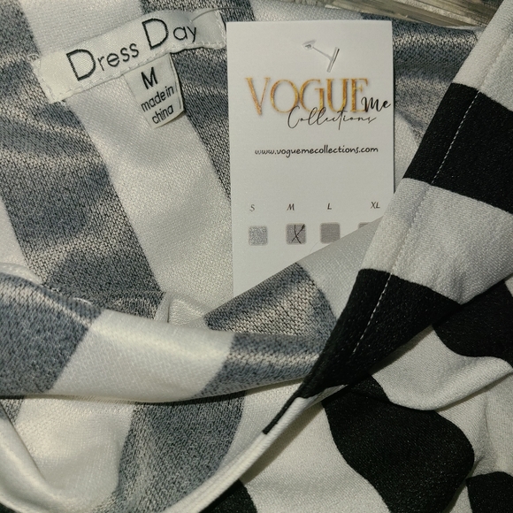 Long sleeve, one side sleeveless, black & white stripped jumpsuit. Size Medium. - Picture 2 of 2